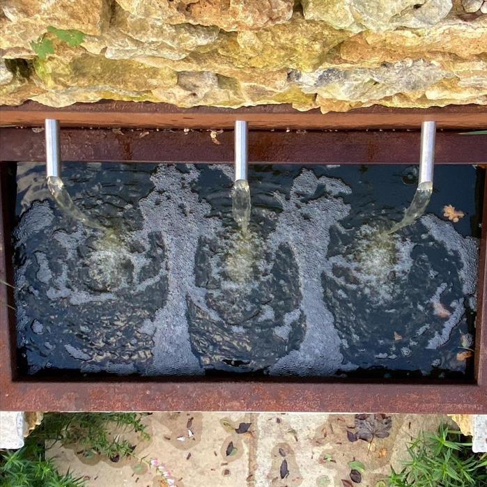 wateruitlopen cortenstaal vijvermuur